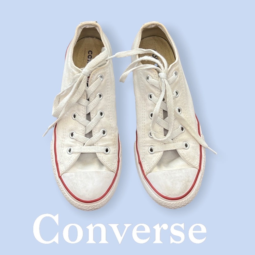 Pair of white all star converse shoes